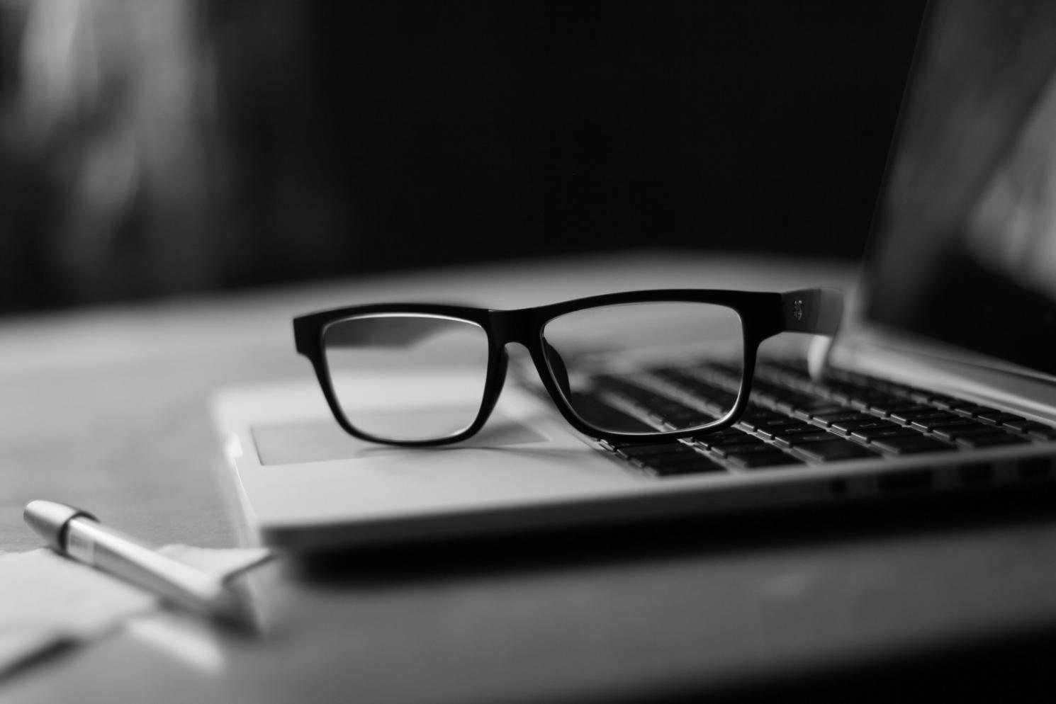 Professional analyzing financial data and budget reports